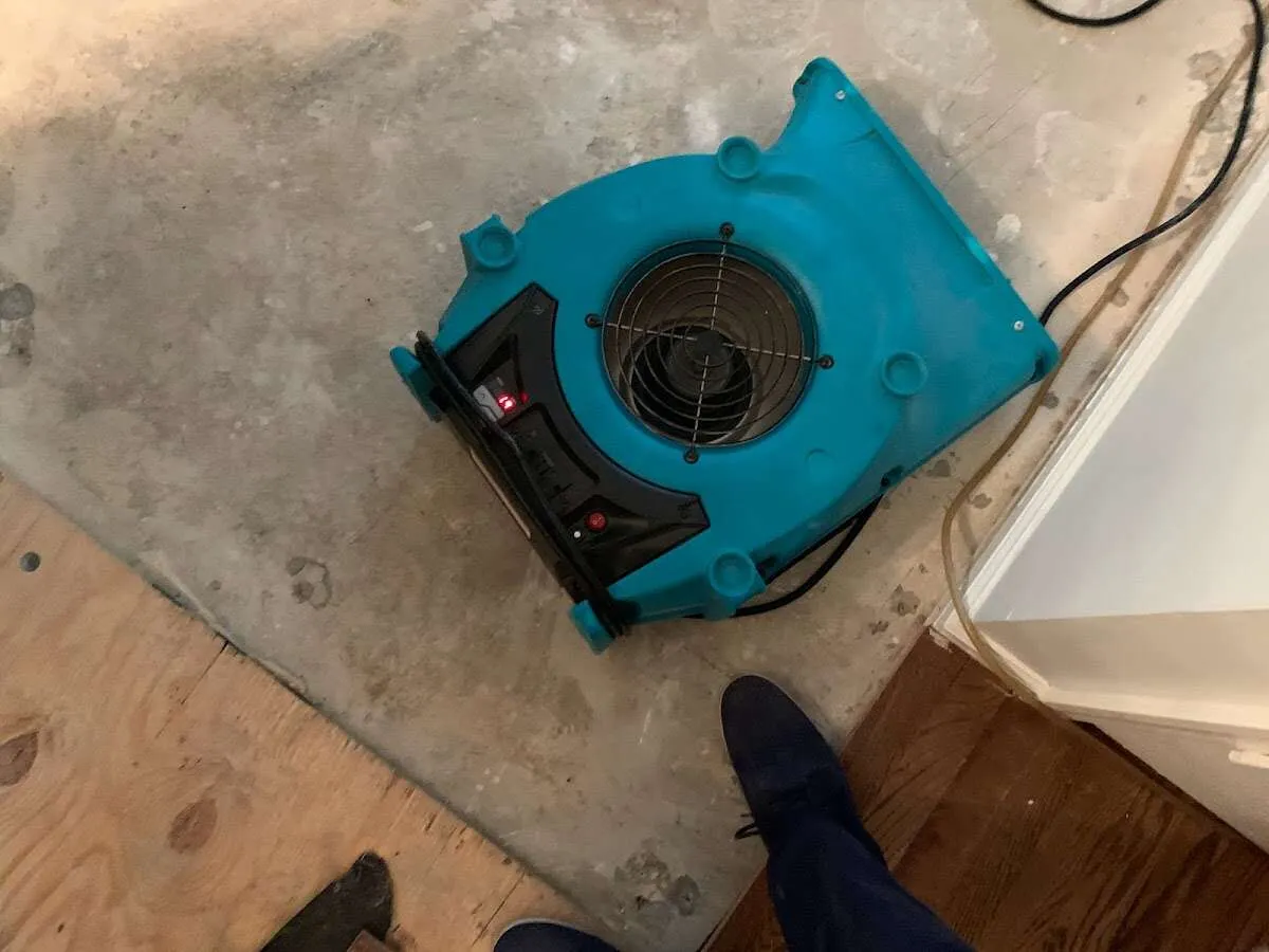 Air mover drying subfloor during Leak Detection & Repair in Glendora